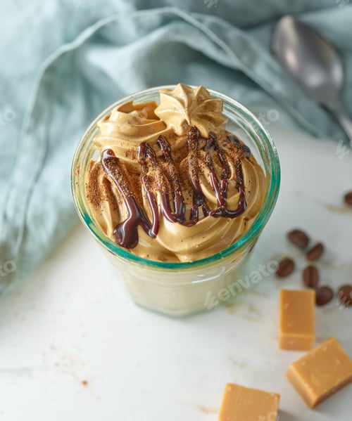 Preview: glass of whipped coffee and caramel mousse cream