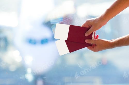 Vista previa: Closeup passports and boarding pass at airport indoor