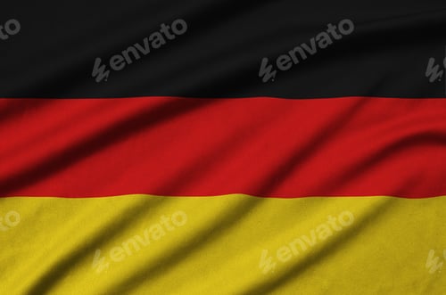 Preview: Germany flag is depicted on a sports cloth fabric with many folds. Sport team waving banner