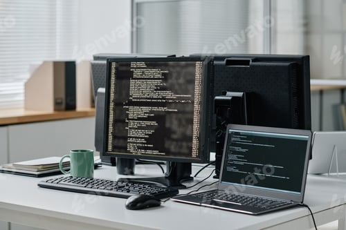 Preview: Computers with codes in modern office