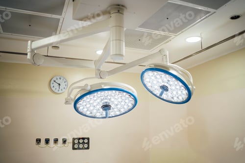 Preview: Bright Examination Lights in a Hospital Operating Room