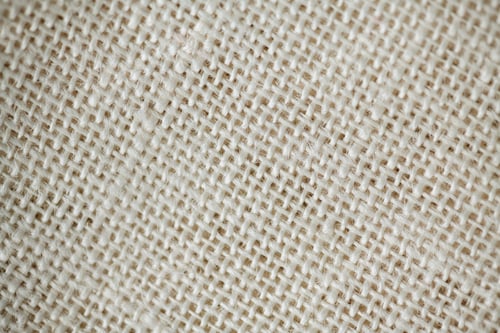 Preview: Close up background, bright delicate pink fabric texture, thread weave, textile texture, perfect for