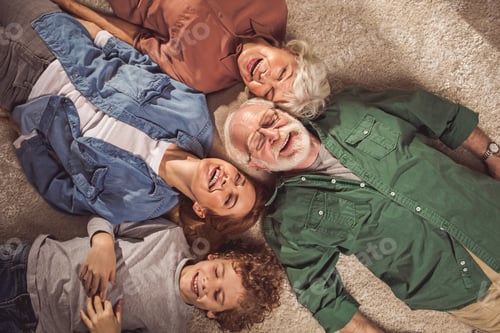 Preview: Top View Portrait Of Cheerful Bearded Grandfather With Happy Wife And Outgoing Daughter With