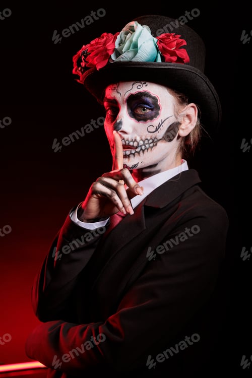 Preview: Woman does keep quiet shush sign, wearing la Catrina costume