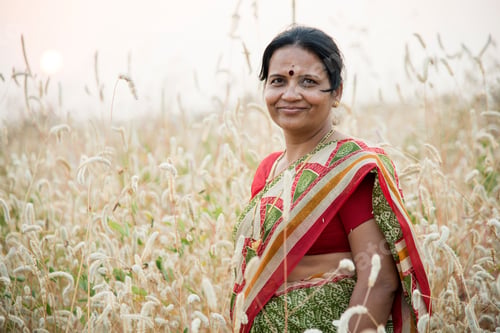 Preview: Smiling woman farmer in agricultural field