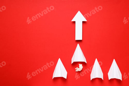 Preview: Business, startup and sponsorship concept with paper planes on red background