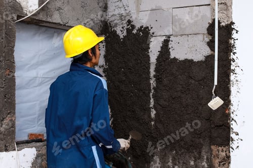 Preview: Labourer Applies Cement For Plastering Wall