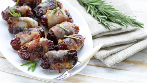 Preview: delicacy appetizer fried dates with bacon and rosemary