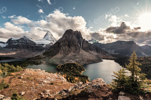 Preview: Mount Assiniboine with lake in autumn forest on Niblet peak at provincial park