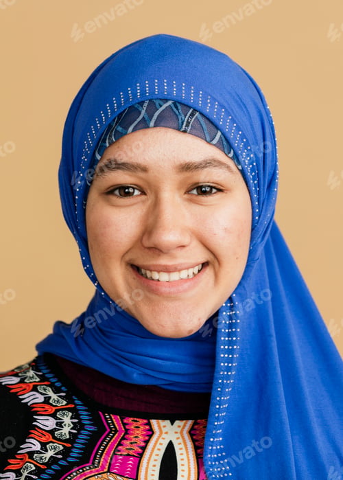 Preview: Happy Islamic woman in a blue hijab