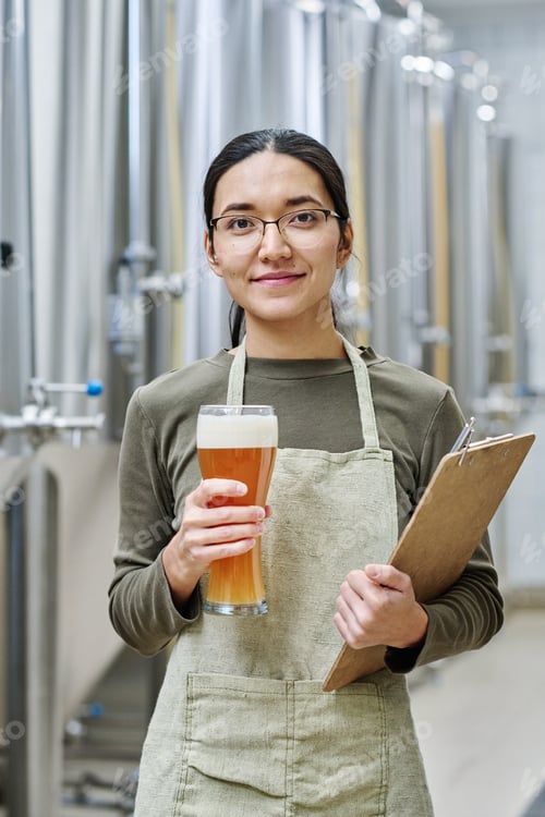 Preview: Brewer checking the beer at plant