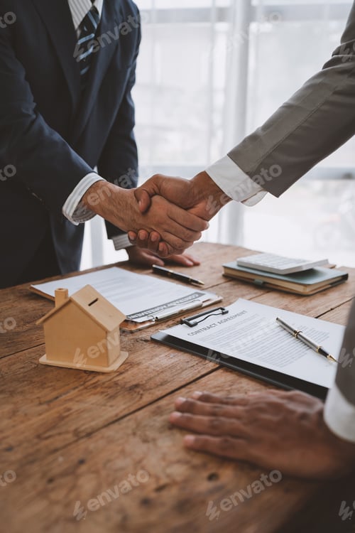 Preview: Handshake of real estate brokers with customers or investors, mortgage loan agreements Make a lease-