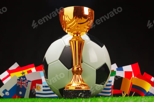 Preview: Golden trophy displayed with soccer ball and flags representing different countries