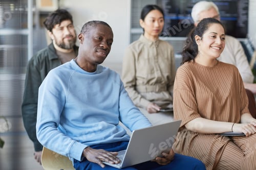 Preview: Smiling Business People at Seminar