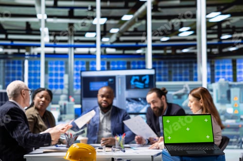 Preview: Factory shareholders reviewing system health metrics with mockup laptop