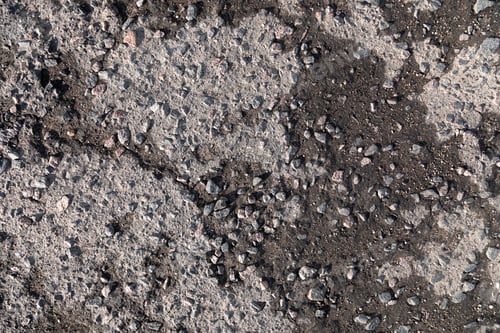 Preview: Wet destructed road pavement worn because of the weather
