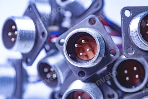 Preview: Close-up blurry metal sockets for plugs