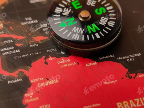 Preview: Closeup red venezuela map and black compas,Venezuela's viral issue with the US