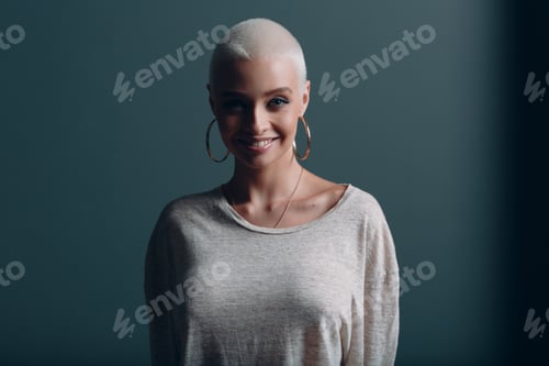 Preview: Millenial young smiling woman with short blonde hair portrait