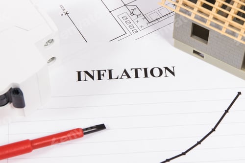 Preview: Inscription inflation with electric fuse, work tools, small house under construction