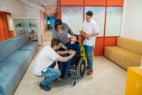 Preview: Family with child in wheelchair attending physical therapy appointment