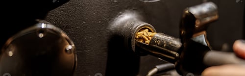 Preview: Male worker using industrial coffee roasting machine