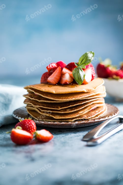 Preview: A stack of pancakes with maple syrup