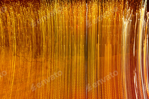 Preview: Golden blurred lines of lights, long exposure, abstract glowing shiny background