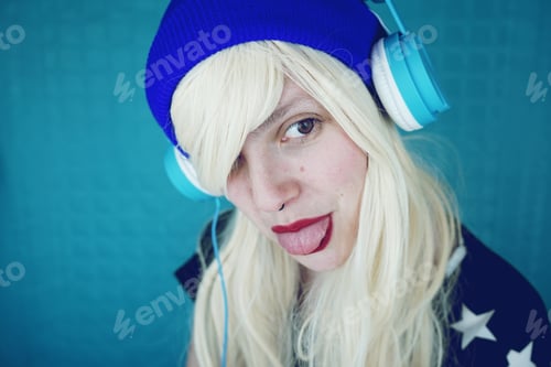 Preview: Beautiful blonde woman listening to music