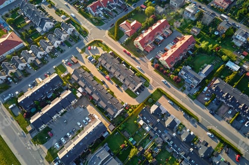 Preview: Aerial view of suburban neighborhood with modern houses and green gardens