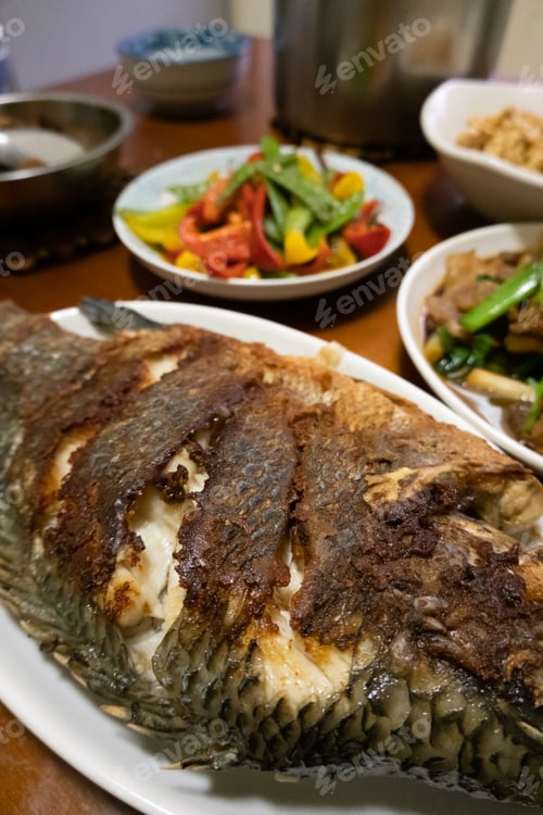 Preview: Home-Cooked Meal Of Sauteed Fish On The Table