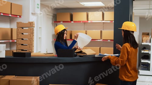 Preview: Asian team of employees doing supplies quality control