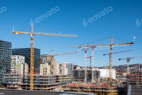 Preview: Construction building with cranes and derrick
