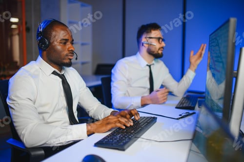 Preview: Center of dispatching maintenance. Portrait of men working via headset microphone