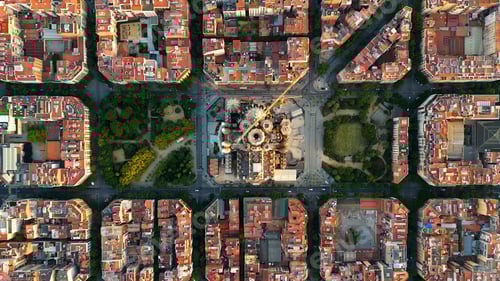 Preview: Aerial view of Barcelona city skyline and Sagrada Familia Cathedral. Eixample residential grid