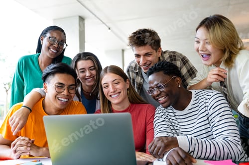 Preview: Diverse friends collaborating effortlessly on a laptop in a vibrant, bright space