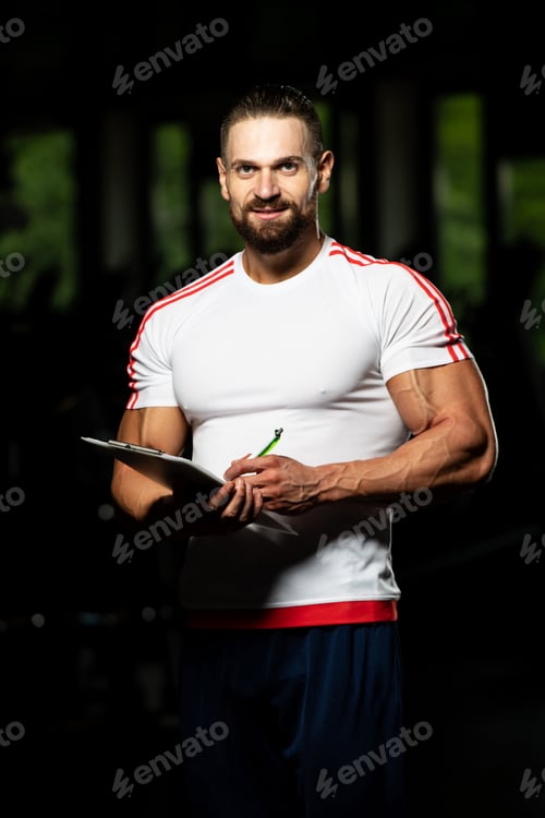 Preview: Caucasian Instructor Takes Notes On Clipboard