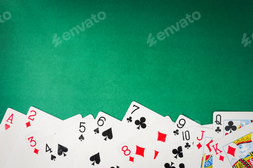 Preview: Playing cards on green background. Free space for text