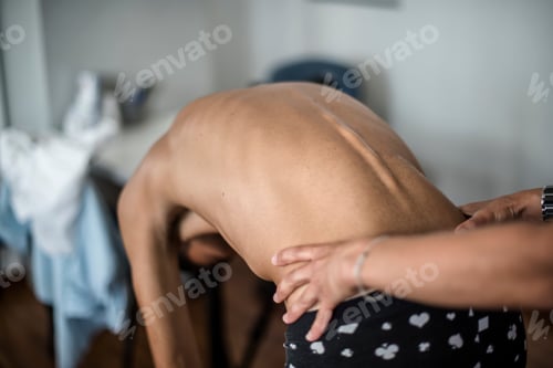 Preview: orthopedic physiotherapist check body growth of young athlete