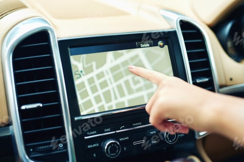 Preview: Finding locations the efficient and easy way. Shot of an unrecognizable woman using a gps in a car.