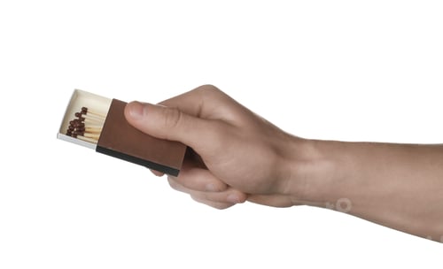 Preview: Man holding box with matches on white background, closeup