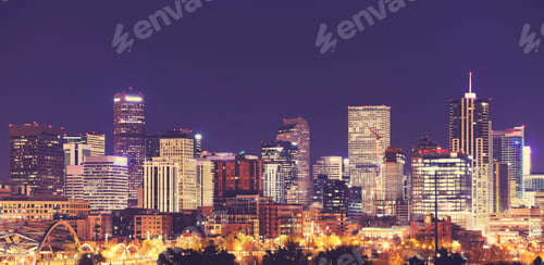 Preview: Vintage toned Denver downtown skyline at night, USA.