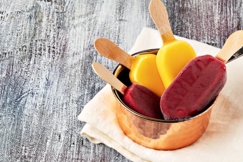 Preview: Fruit popsicles ice cream on a plate.