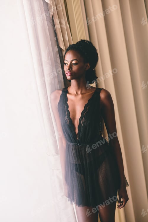 Preview: Young black woman in the room