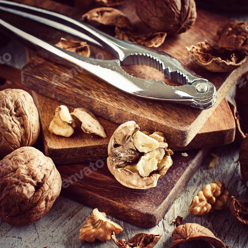 Preview: Fresh walnuts on an old wooden table