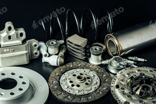 Preview: Close up of new car parts on black background