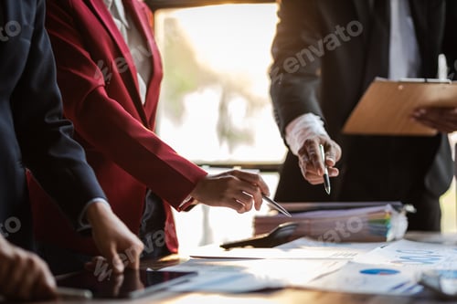 Preview: Business meeting, Company executives meeting discussing strategic analysis and business planning.