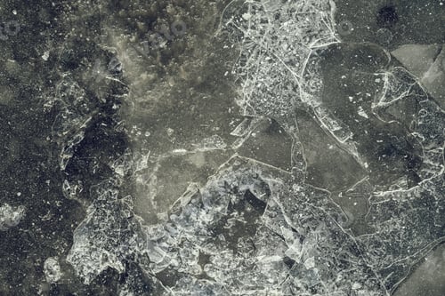 Vista previa: Gray-Green Color Texture Of A Glossy Surface Of Ice With Cracks And With Splinters For Abstract