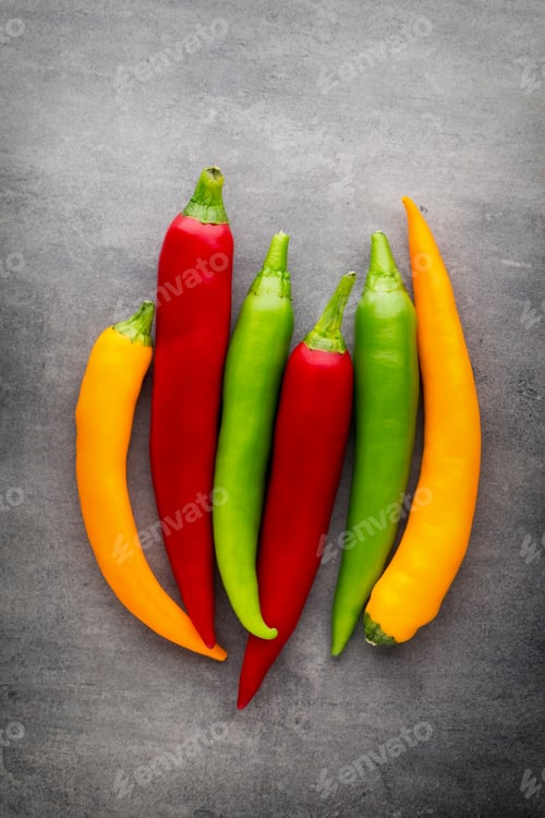 Preview: Chilli pepper on the grey background.