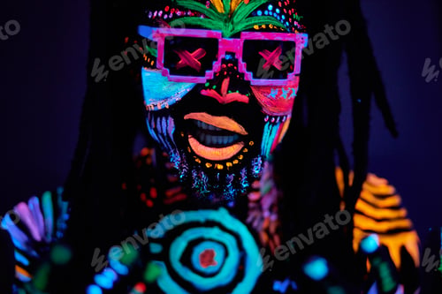 Preview: close-up portrait of dj dancer with luminescent make-up
